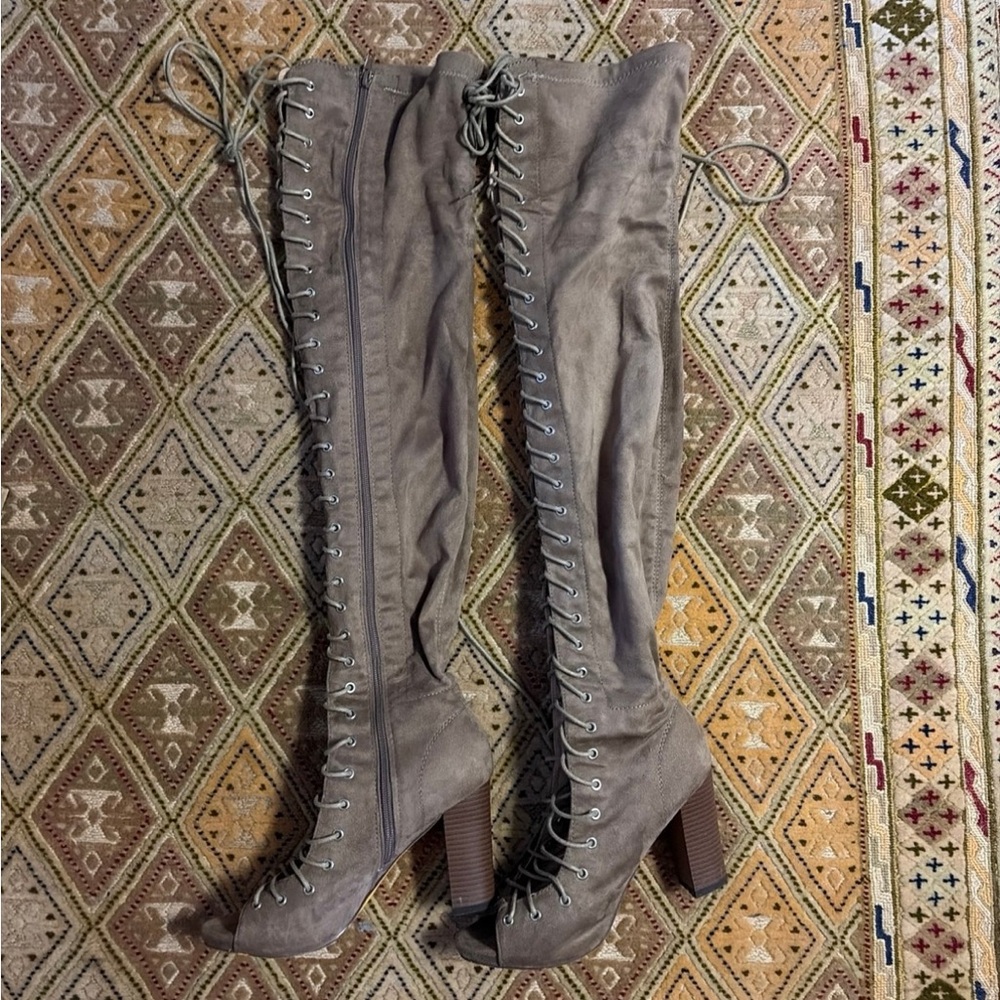 Over the knee lace up boots